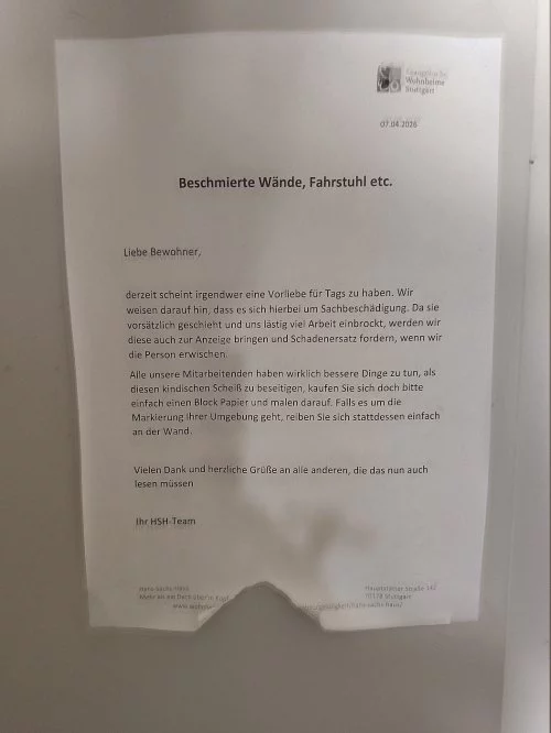 Graffiti, Tags und Co bei der Wohnbau beschmierte-waende